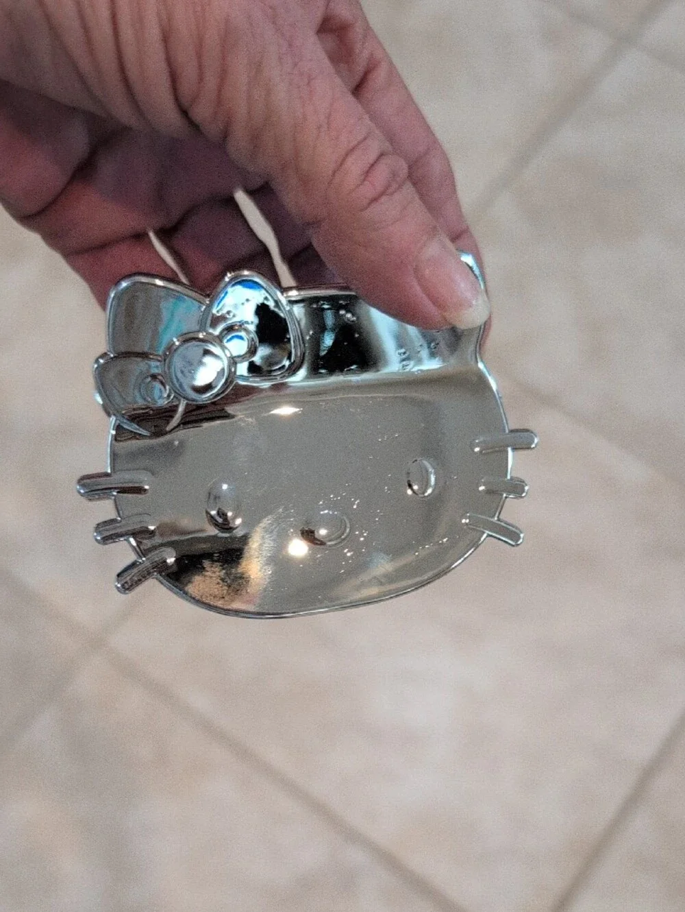 Hello Kitty Silver Toned Chromed Face And Bow Hair Clip